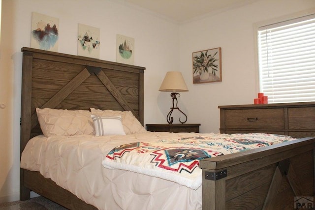 bedroom featuring ornamental molding