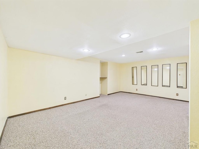 9 Woodsorrel Ct, Pueblo, CO 81001 - spare room featuring light colored carpet, recessed lighting, and baseboards