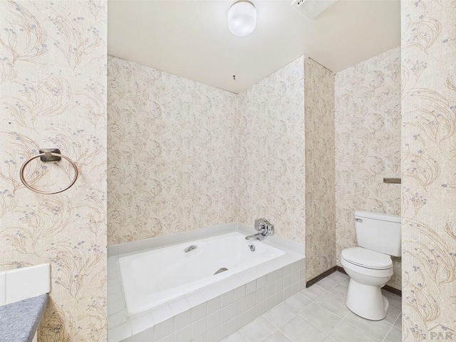9 Woodsorrel Ct, Pueblo, CO 81001 - full bathroom featuring wallpapered walls, toilet, a bath, and tile patterned floors