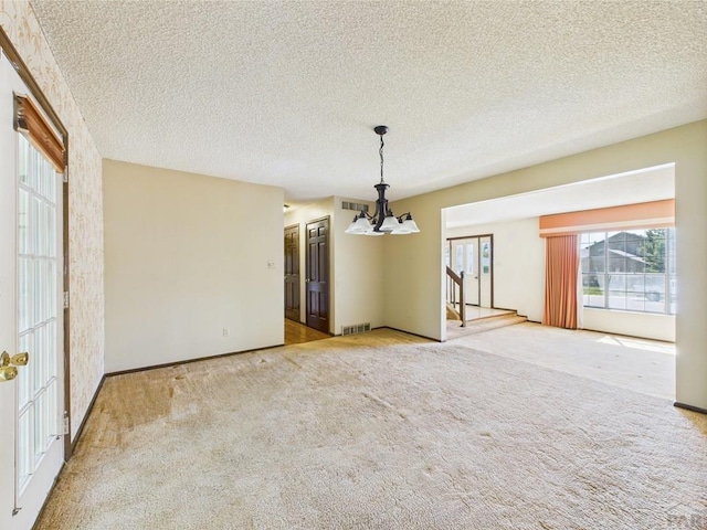 9 Woodsorrel Ct, Pueblo, CO 81001 - carpeted spare room with a textured ceiling