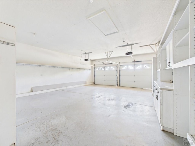 9 Woodsorrel Ct, Pueblo, CO 81001 - garage featuring a garage door opener