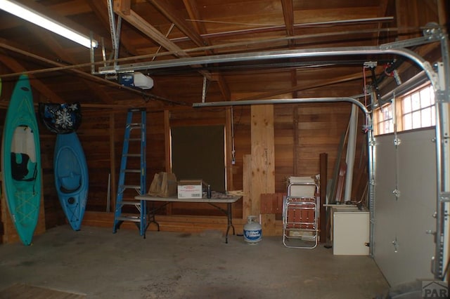 garage featuring a garage door opener