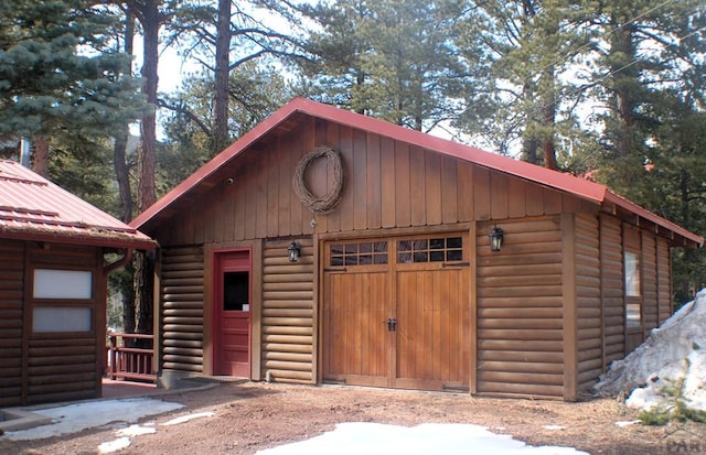 view of outbuilding with an outbuilding