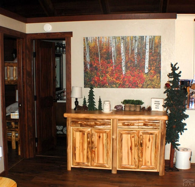 corridor with dark wood-style floors