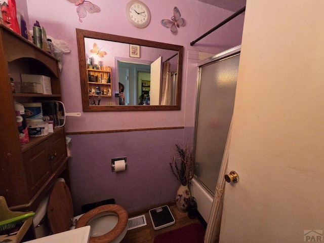 full bath with visible vents and combined bath / shower with glass door