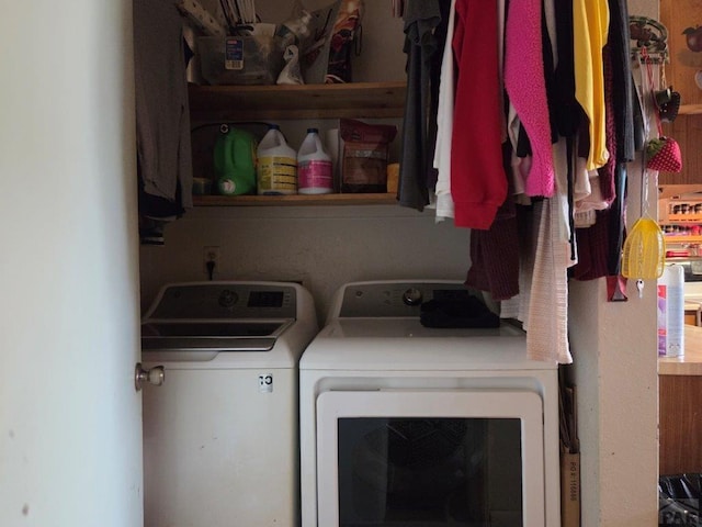 laundry area with washing machine and dryer and laundry area