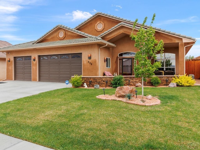 ranch-style home with a garage, fence, driveway, stucco siding, and a front yard