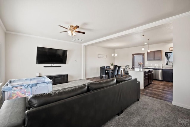 living room with ceiling fan, baseboards, visible vents, and crown molding