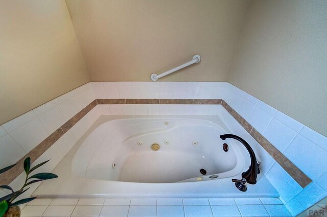 bathroom featuring a whirlpool tub