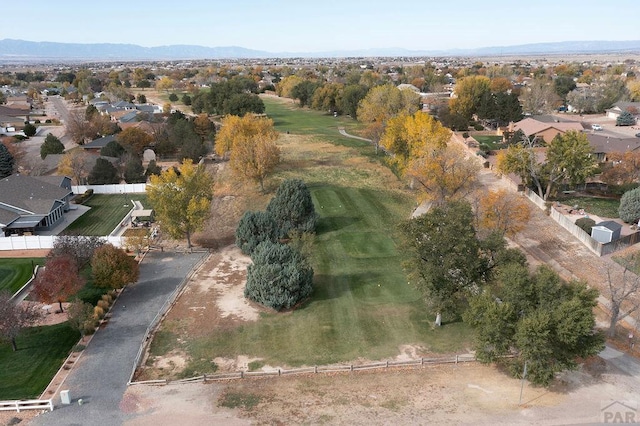 drone / aerial view featuring a mountain view and a residential view