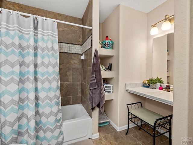 full bath featuring shower / bath combo, tile patterned flooring, and baseboards