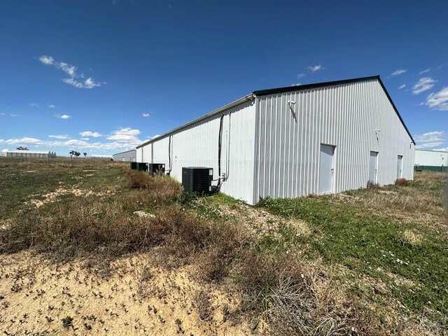 view of pole building with central AC unit