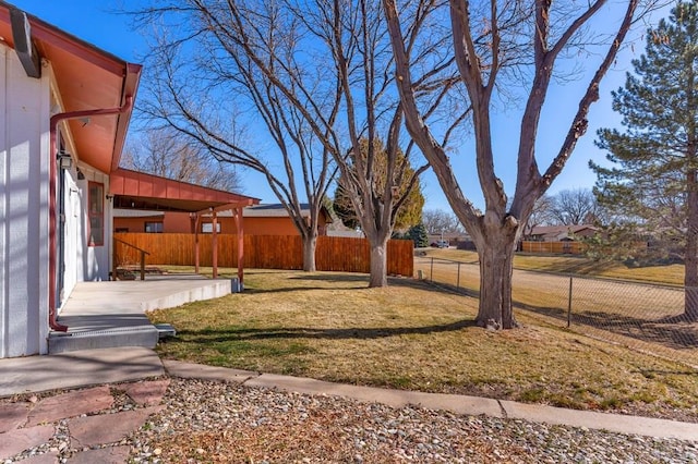 view of yard with fence