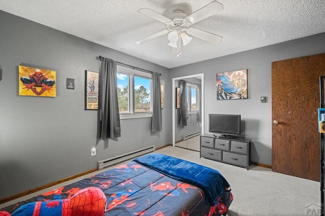 bedroom featuring baseboards, light carpet, a textured ceiling, and baseboard heating