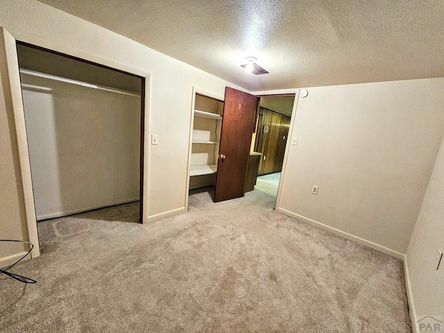 3112 Withers Ave, Pueblo, CO 81008 - unfurnished bedroom with carpet, a textured ceiling, and baseboards