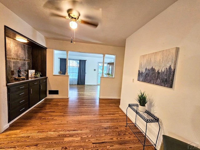 3112 Withers Ave, Pueblo, CO 81008 - hall featuring dark wood-style floors and baseboards