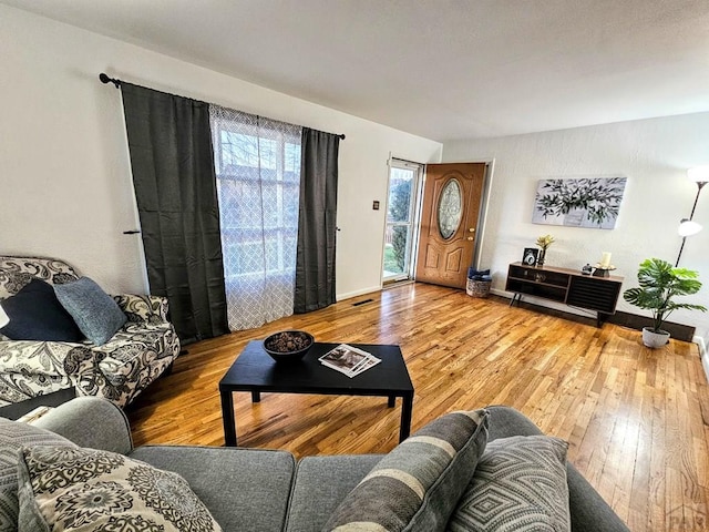 3112 Withers Ave, Pueblo, CO 81008 - living area with hardwood / wood-style flooring and baseboards