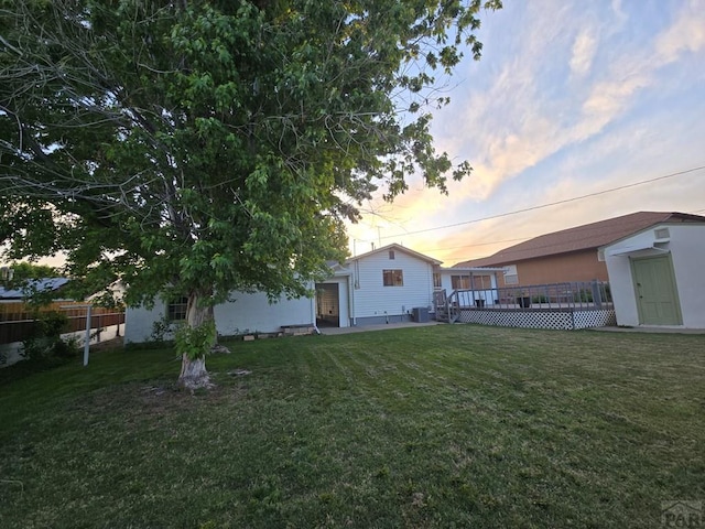 3112 Withers Ave, Pueblo, CO 81008 - view of yard with cooling unit and a wooden deck