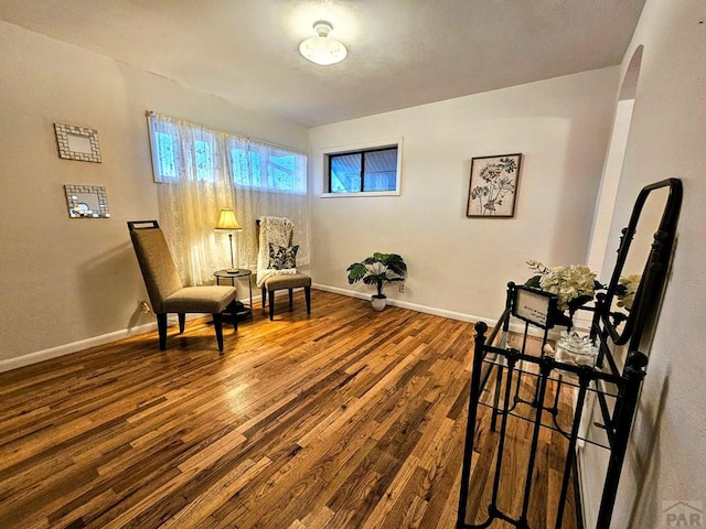 3112 Withers Ave, Pueblo, CO 81008 - living area featuring wood finished floors and baseboards
