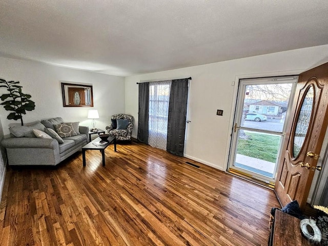 3112 Withers Ave, Pueblo, CO 81008 - living room featuring wood finished floors