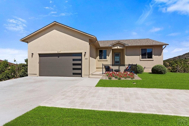 ranch-style home featuring roof with shingles, stucco siding, an attached garage, driveway, and a front lawn