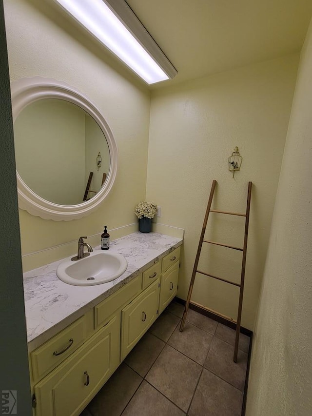 bathroom featuring tile patterned floors and vanity