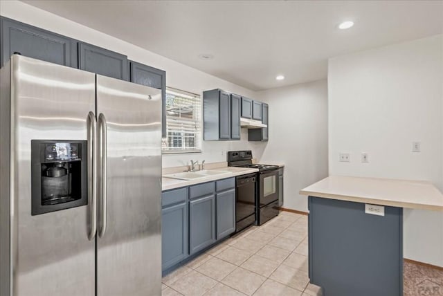 kitchen featuring a breakfast bar, light countertops, a sink, black range with electric cooktop, and stainless steel fridge with ice dispenser