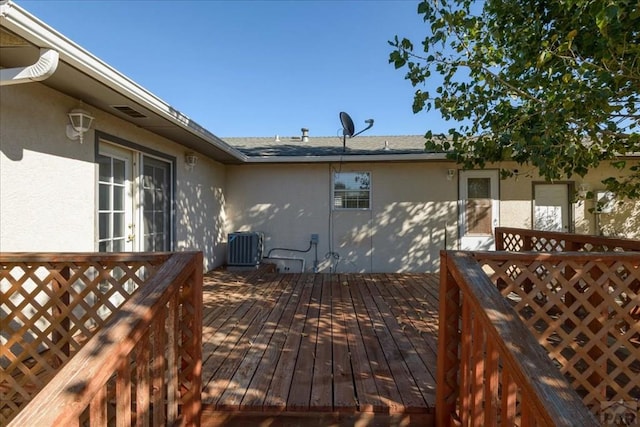 wooden terrace with central air condition unit