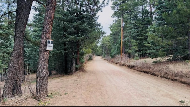 8888 Zorn Rd, Rye, CO 81069 - view of street featuring a forest view
