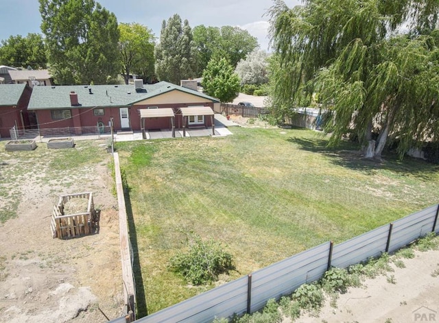 view of yard with a patio area and fence