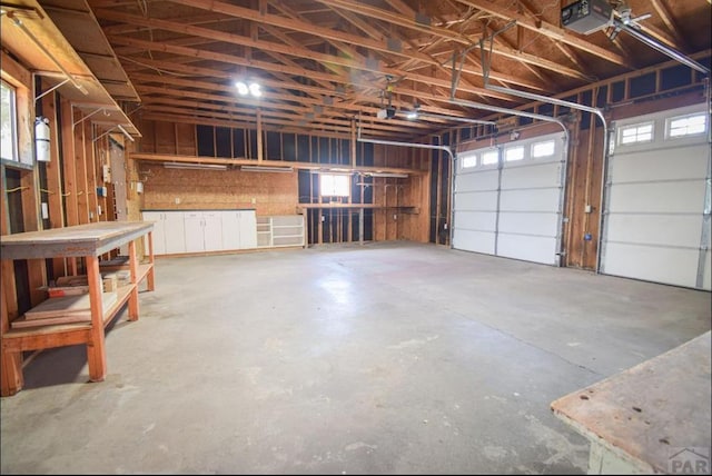 garage featuring a garage door opener