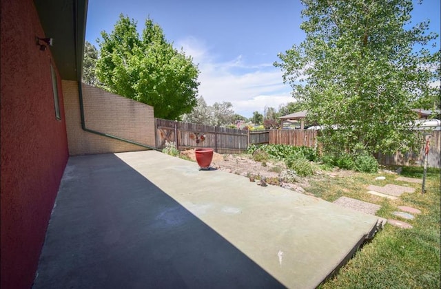 view of patio with a fenced backyard