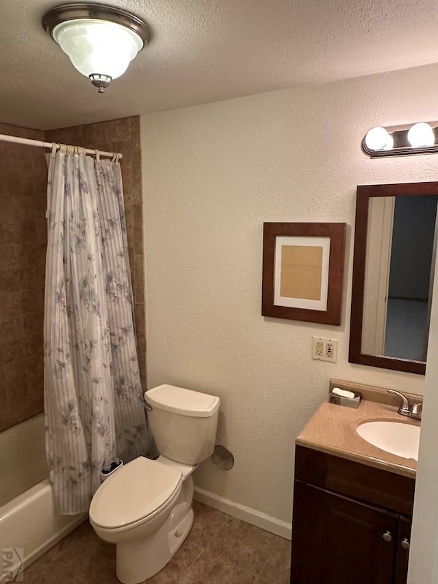 full bath featuring vanity, baseboards, shower / tub combo, a textured ceiling, and toilet