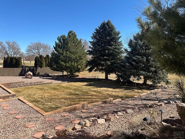 view of yard with fence