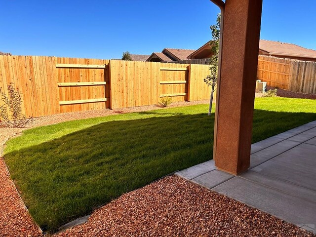 view of yard featuring a fenced backyard