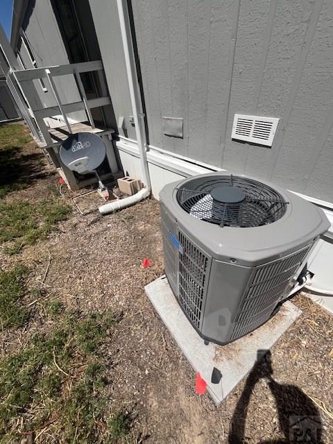 exterior details with central air condition unit