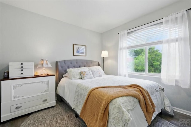 433-435 E Stardust Dr, Pueblo West, CO 81007 - bedroom featuring baseboards and wood finished floors