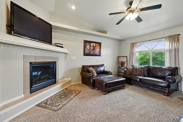 433-435 E Stardust Dr, Pueblo West, CO 81007 - living area with carpet floors, lofted ceiling, a fireplace, and ceiling fan