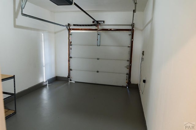 garage featuring baseboards