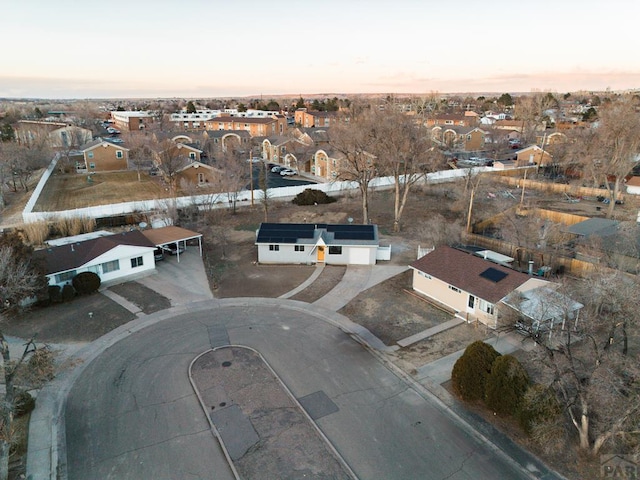 aerial view at dusk with a residential view