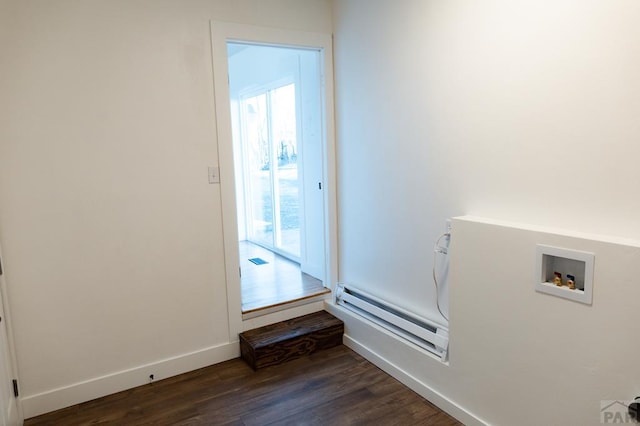 entryway featuring a baseboard radiator, baseboards, and dark wood-type flooring