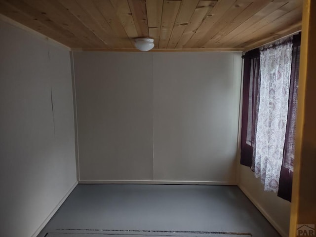 spare room with wooden ceiling