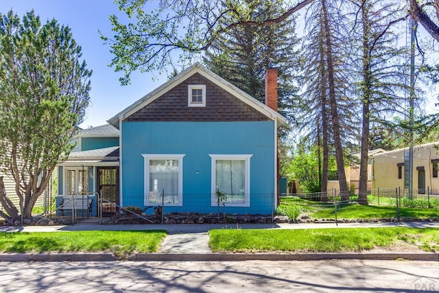 319 S Main St, La Veta, CO 81055 - view of front of property with a chimney and french doors