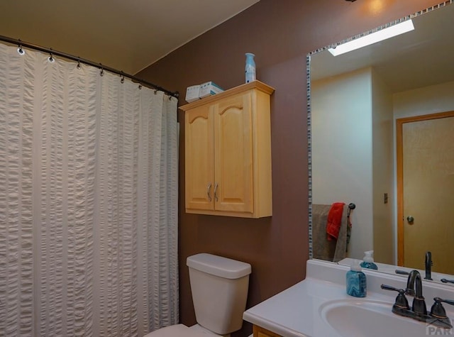 full bath with vanity and toilet