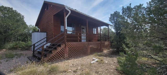 view of home's exterior featuring stairway