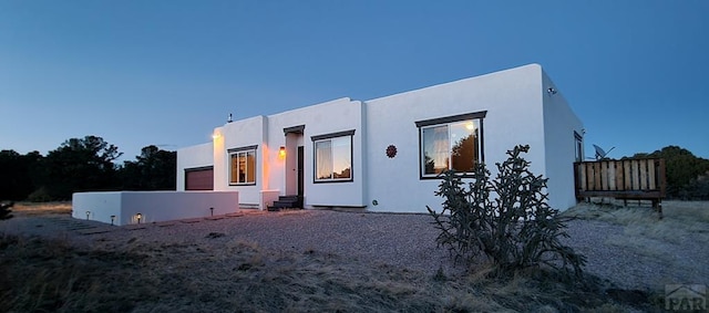 view of front of home with stucco siding