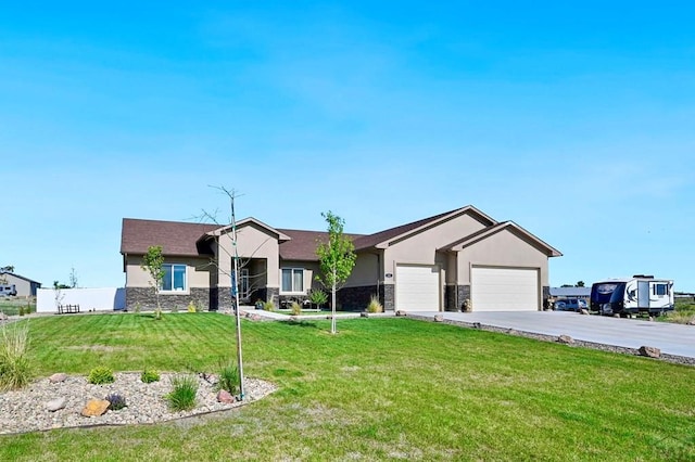 view of front of home featuring stone siding, a front lawn, an attached garage, and stucco siding