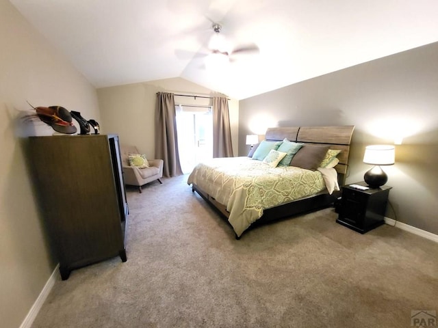 bedroom with vaulted ceiling, baseboards, a ceiling fan, and light colored carpet