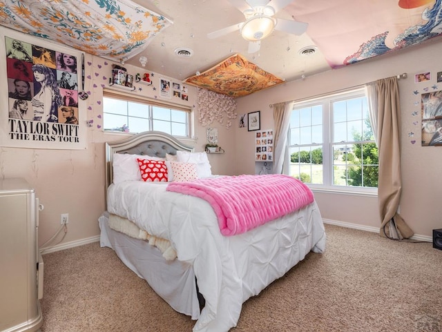 348 S Tejon Ln, Pueblo West, CO 81007 - carpeted bedroom featuring baseboards and ceiling fan