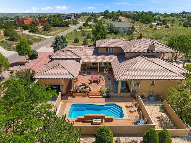 348 S Tejon Ln, Pueblo West, CO 81007 - view of pool with a fenced backyard and a patio area